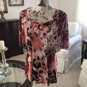 Total cuteness and you will love this top. Multi colored top by Susan Lawrence